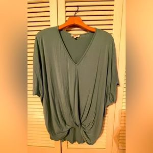 Excellent condition; small; Umgee green/blue top